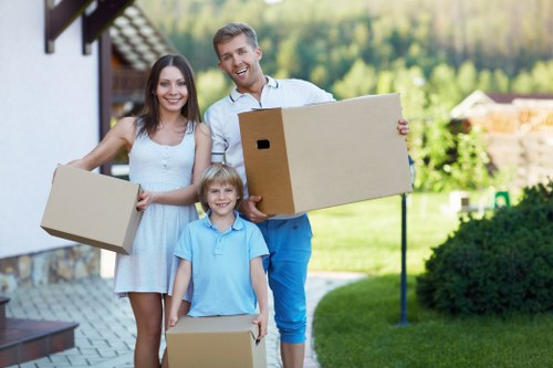 Home moving team planning a relocation in a Brent residential street