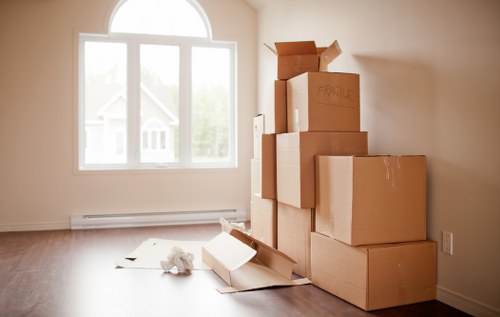 Local removal service loading boxes and furniture for a Brent relocation