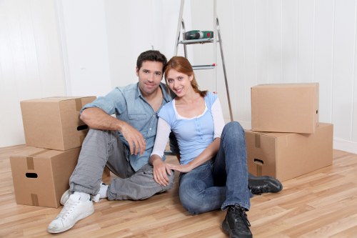 Professional movers handling a flat move in Brent with stairs and access planning